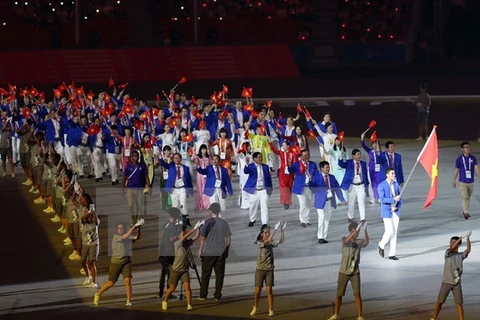 附图：越南体育代表团。（图片来源：越通社） 