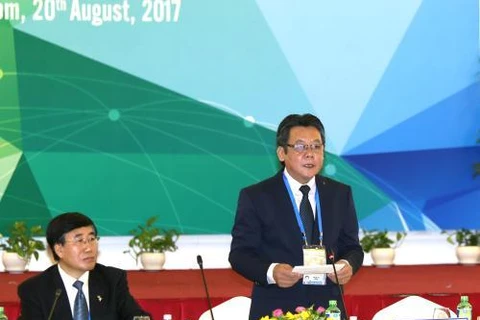 越南农业与农村发展部国际合作司司长陈金龙在APEC农业技术合作工作组会议上发言。