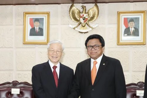 阮富仲总书记会见印尼地方代表理事会主席乌斯曼·沙普达。（图片来源：越通社）
