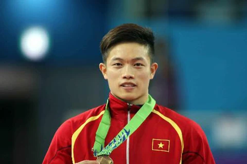 邓南为越南体育代表团夺得第九枚金牌