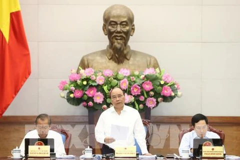 阮春福总理：政府及直属机构应继续与企业同行