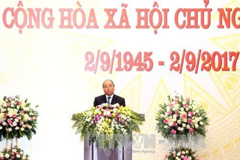 阮春福总理在招待会上发表讲话。（图片来源：越通社）