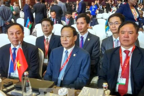 越南公安部副部长黎贵王上将率领越南代表团出席大会。（图片来源：越通社）