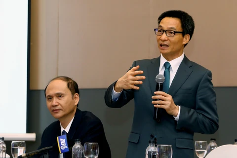越南政府副总理武德儋在研讨会上发表讲话。（图片来源：越通社）