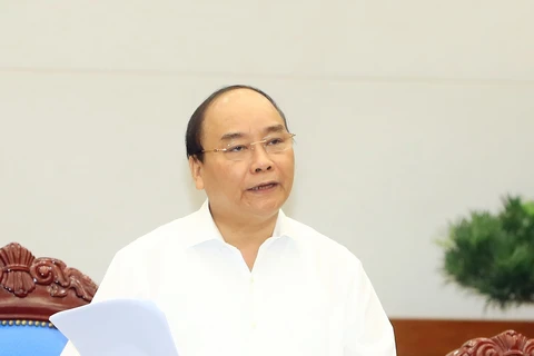 越南政府总理阮春福在会上发表讲话。（图片来源：越通社）