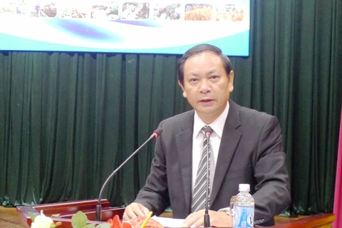 越南农民协会副主席娄武调在研讨会上发表讲话。（图片来源：越共电子报）