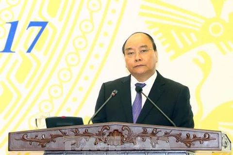 越南政府总理阮春福： 对政策性银行和贫困人口的投资就是为发展投资 
