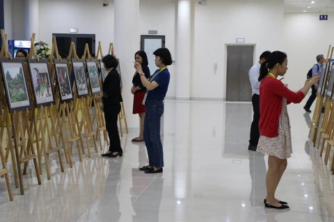 “越南风土人情”图片展在国际新闻中心举行。
