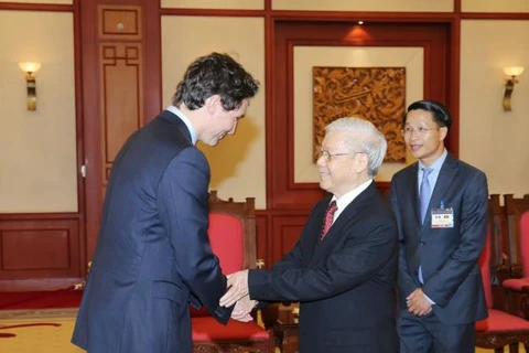 越共中央总书记阮富仲与国会主席阮氏金银分别会见加拿大总理特鲁多