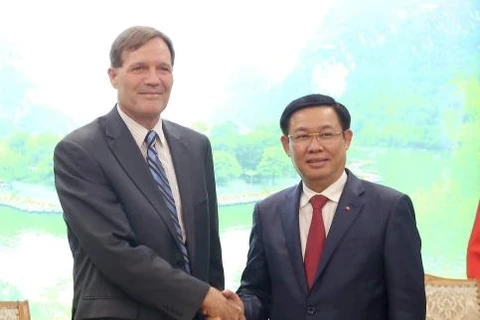 政府副总理王廷惠会见USAID驻越首席代表迈克尔·格林。（图片来源：越通社）