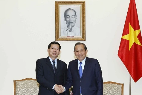 政府常务副总理张和平会见老挝最高人民法院院长坎潘·西提丹帕