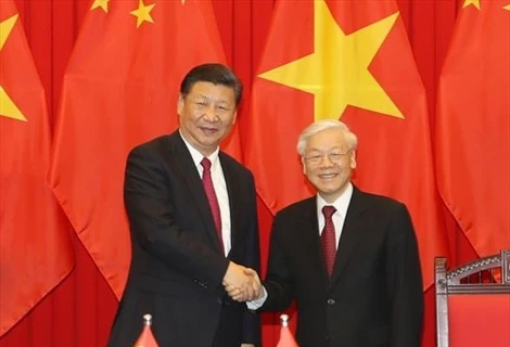 越中领导人互致贺电庆祝两国建交68周年