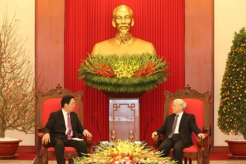 越共中央总书记阮富仲会见离任拜会的中国驻越大使洪小勇