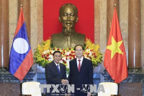 越南国家主席陈大光会见老挝国家主席办公厅主任坎蒙• 蓬塔迪