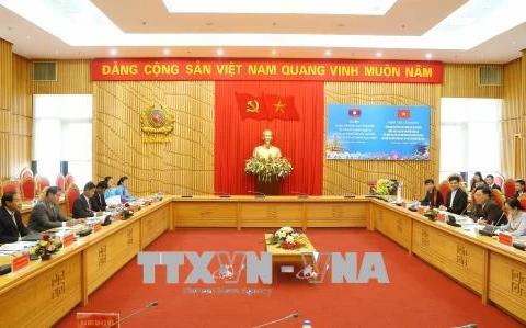 越南公安部同老挝安全部加强群众团体工作的合作