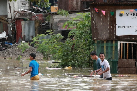 多国受暴雨台风袭击 中国多地交通阻断 菲律宾5人死亡