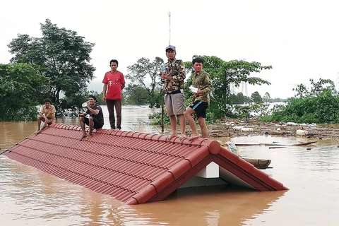 老挝一水电站大坝坍塌 越南领导人为此致慰问电