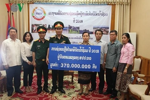 老挝水电站大坝坍塌事故：越南国防部11号兵团向老挝灾民提供援助
