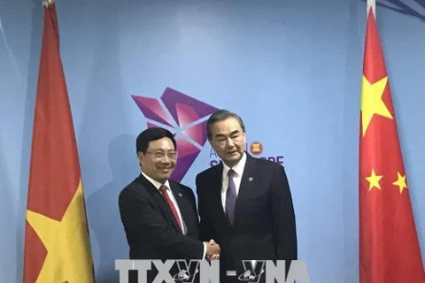 第51届东盟外长会议：越南政府副总理兼外长范平明会见中国外长王毅