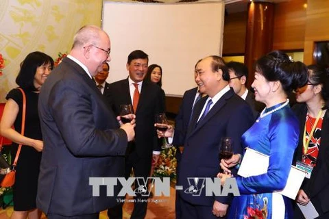 越南政府总理阮春福为国际友人主持国庆招待会