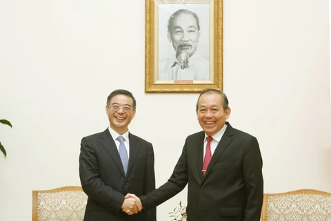 越南政府副总理张和平会见中国最高人民法院院长周强