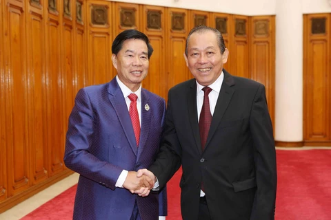 越南政府常务副总理张和平会见万象市委书记兼市长辛拉冯·库派吞