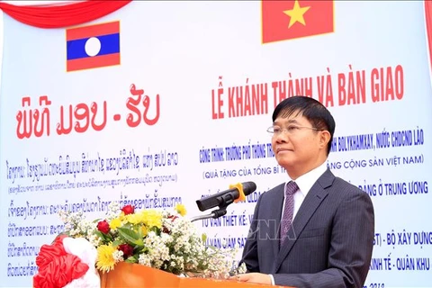 越共中央总书记阮富仲援建老挝波里坎赛省的一所学校落成移交