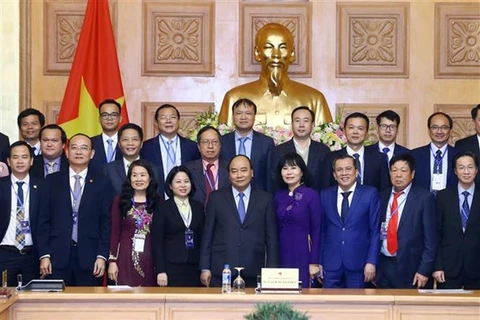 政府总理阮春福会见获得2018年国家知名品牌的企业代表