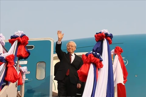 越共中央总书记、国家主席阮富仲抵达老挝首都万象 开始对老挝进行正式友好访问