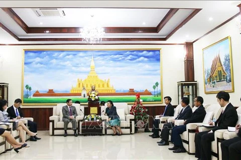 庆祝老挝人民革命党建党64周年
