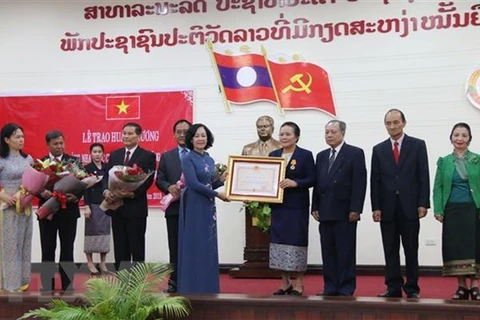 越共民运部代表团访问老挝：双方就群众工作交换经验 