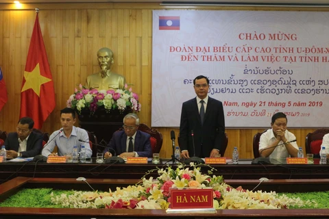 大力推动越南河南省与老挝乌多姆塞省的合作