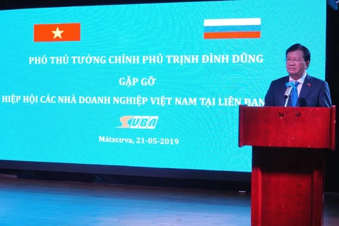 越南政府副总理郑廷勇会见在俄越南企业