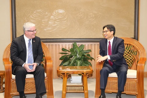  越南政府副总理武德儋会见前来辞行拜会的澳大利亚驻越大使