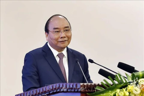 阮春福总理主持召开越南与老挝和柬埔寨合作项目评估会议