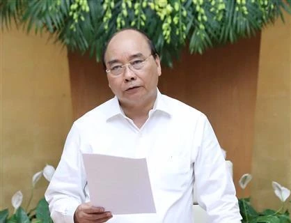 阮春福总理：加大改革力度 促进生产经营发展