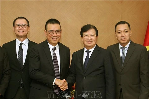 越南政府副总理郑廷勇会见泰国暹罗水泥集团总裁