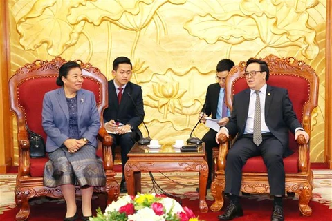 越共中央对外部部长黄平君会见老挝革命人民党中央对外部代表团