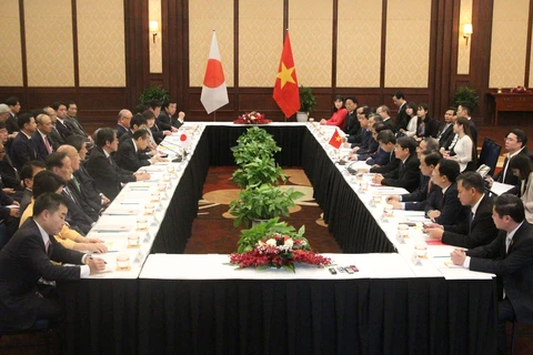 越共中央组织部长范明政会见日本自民党秘书长二阶俊博 
