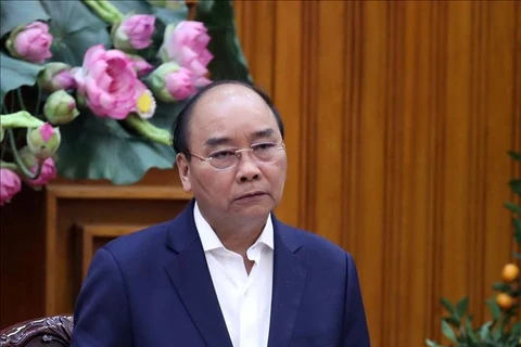 政府总理阮春福：政府愿为保护人民的生命和健康承担经济损失