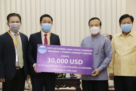  越南企业与老挝政府携手共同抗击新冠肺炎疫情