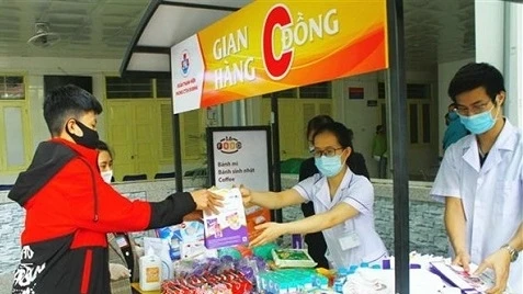 新冠肺炎疫情：乂安省设立零盾货摊以帮助儿童患者