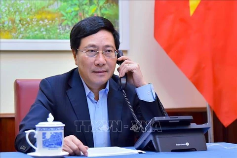 越南政府副总理兼外长范平明同西班牙外长冈萨雷斯-拉亚通电话