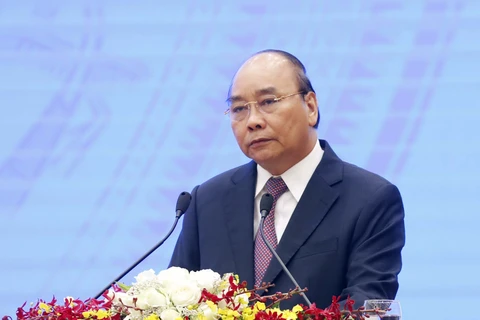 越南政府总理阮春福： 越南经济就像被压缩的弹簧 越压后续反弹越强烈