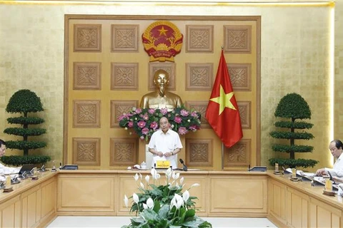 政府总理与企业对话会：越南企业和越南经济朝着积极方向发展