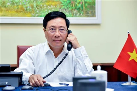 政府副总理兼外长范平明与韩国外交部长康京和通电话