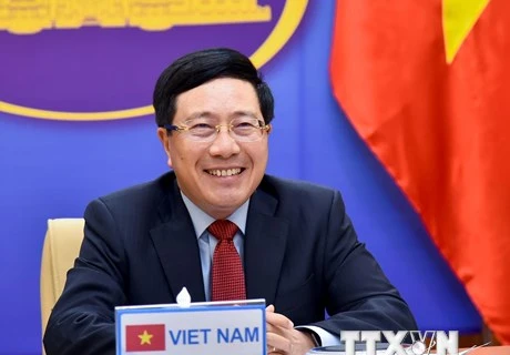 越南政府副总理兼外长范平明与沙特阿拉伯外交大臣费萨尔通电话