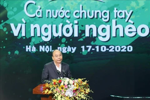 政府总理阮春福出席2020年“全国携手帮助贫困者”活动