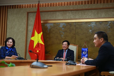 范平明与世行首席执行官阿克塞尔举行视频工作会议
