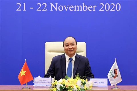 越南政府总理阮春福出席以视频方式举行的二十国集团领导人峰会
